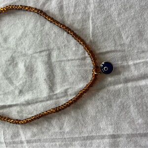 Snakes and Shanti Necklace with Evil Eye Pendant